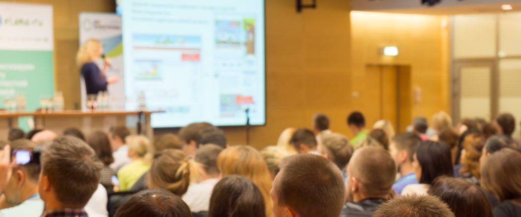 header - Audience at the conference 2400 x 1000